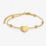 Elegant gold bracelet with heart - Image 2